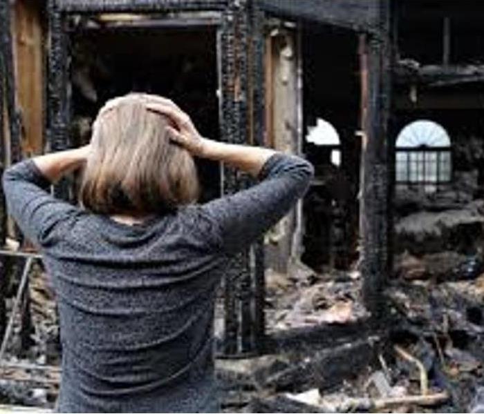 Women in distress over a fire loss